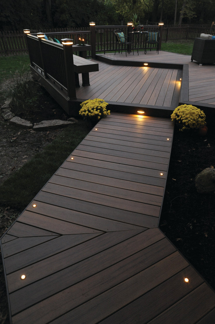 Solar deck lighting kit installed on an outdoor deck