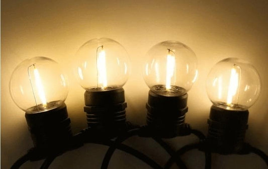 Solar festoon lights with warm white globes