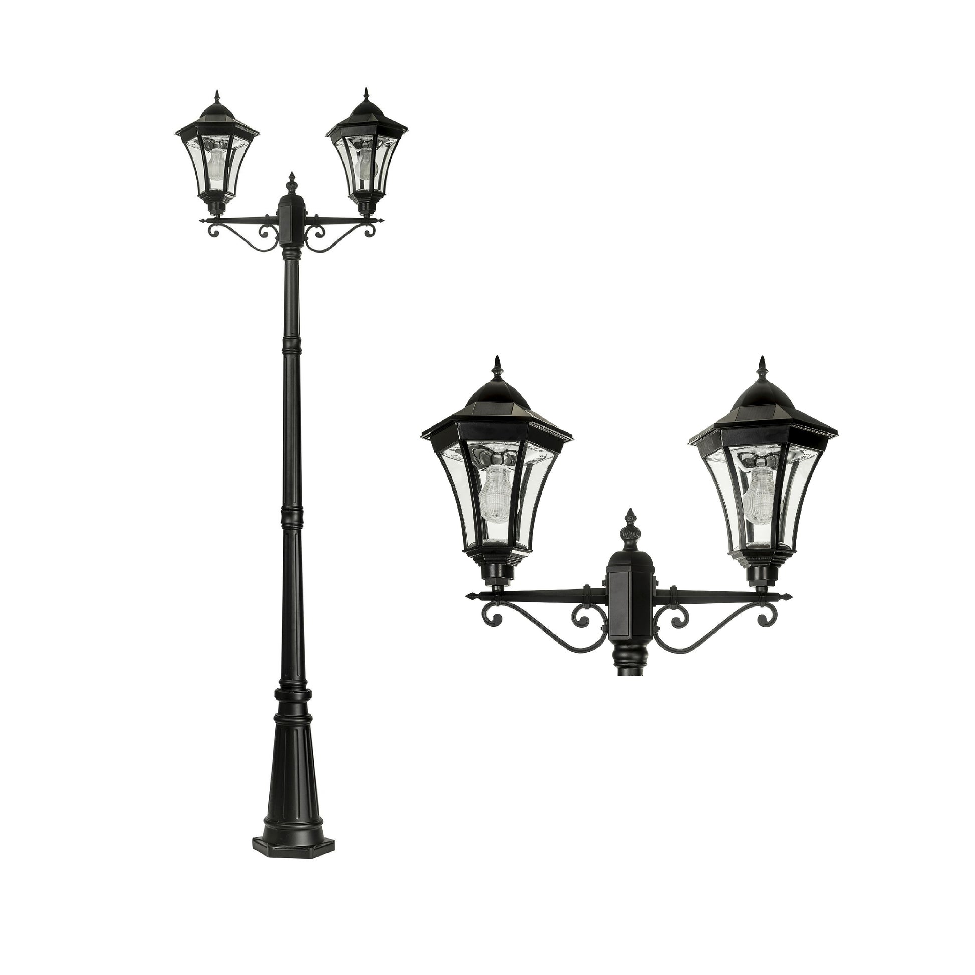 A traditional dual head solar post light made of die cast aluminium powder coated black,with a built-in solar panel and a glass lampshade, designed for outdoor installation