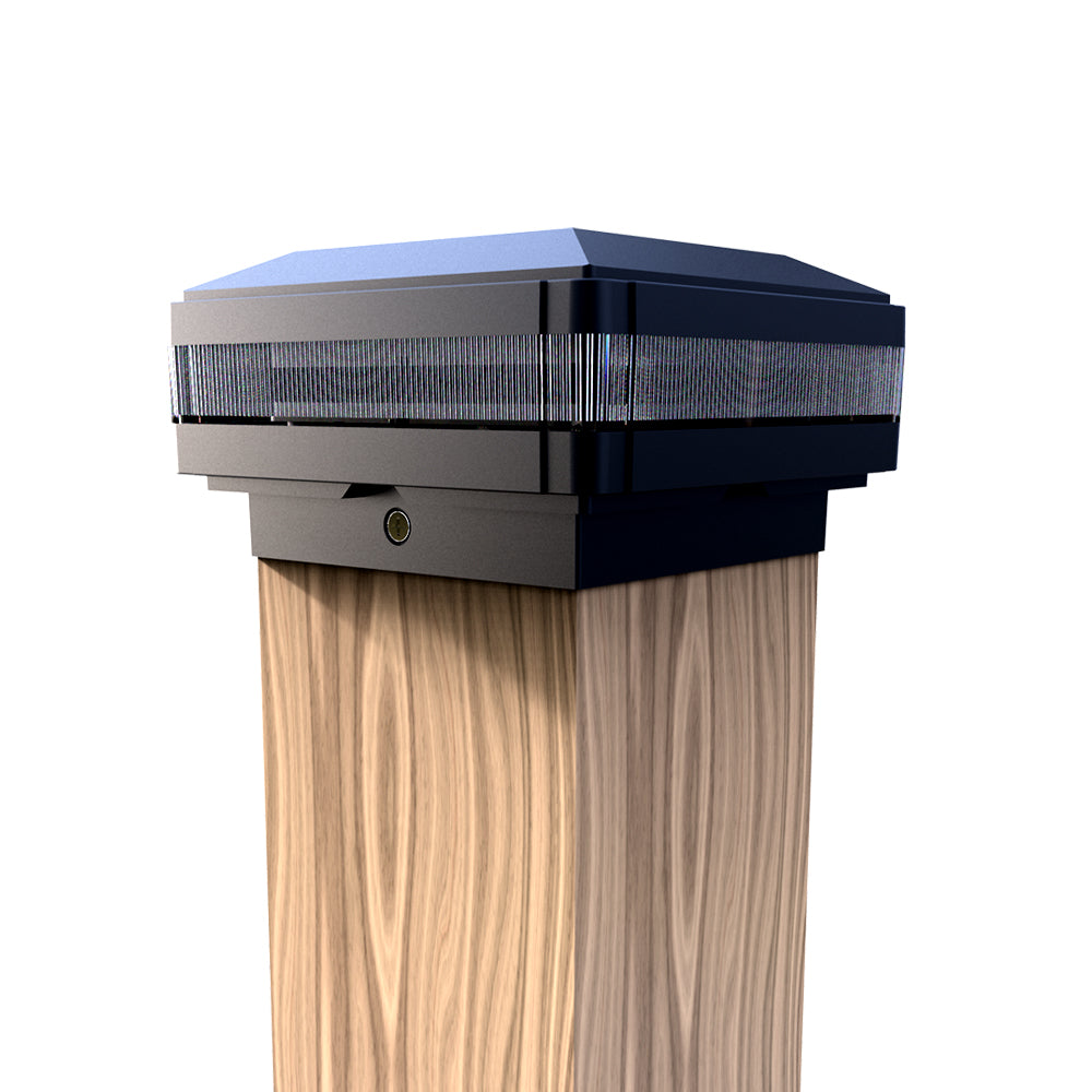 A modern solar post topper light with a black finish and LED lights, designed to fit over a wooden post.