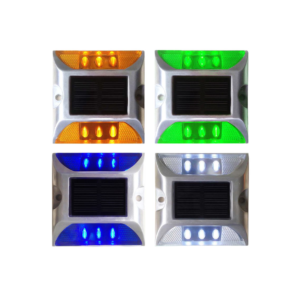 Four solar powered LED road stud lights in amber, blue, white and green