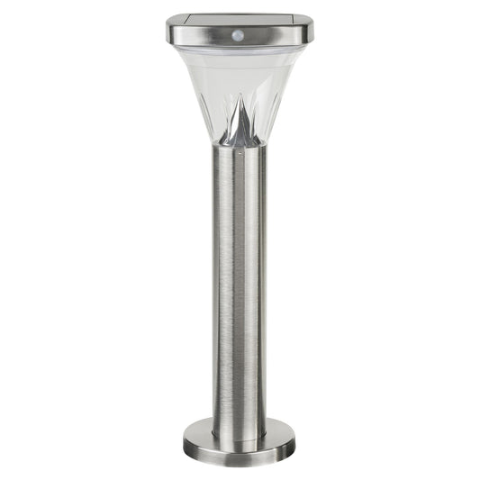 A stainless steel bollard light with a built-in solar panel on top and a tapered lens, mounted on a spike for outdoor placement.