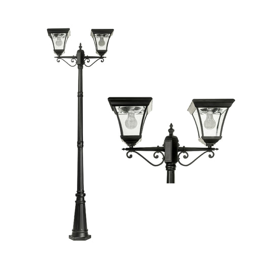 A traditional dual head solar post light made of die cast aluminium powder coated black,with a built-in solar panel and a glass lampshade, designed for outdoor installation